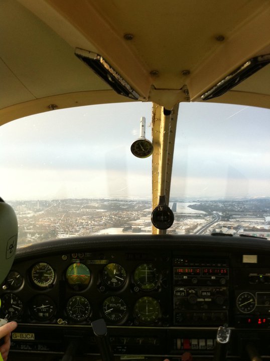 A cockpit view, taken on final to runway 31 at Plymouth, on a rare snowy day! additional image 1